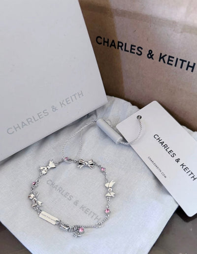 CHARLES & KEITH粉色水晶蝴蝶結手鍊 - Topickstore